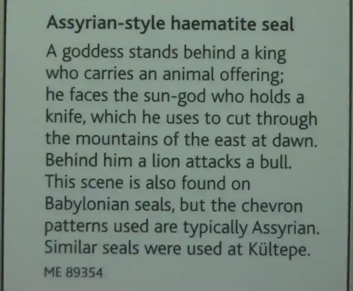 Solar disc on a black hematite cylinder seal